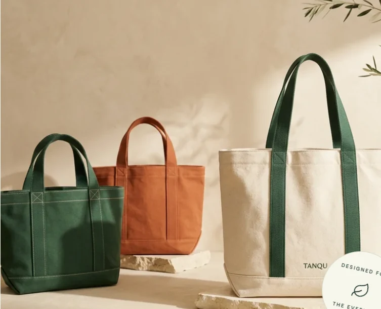 Three canvas shopping bag design references in green, brown and natural canvas